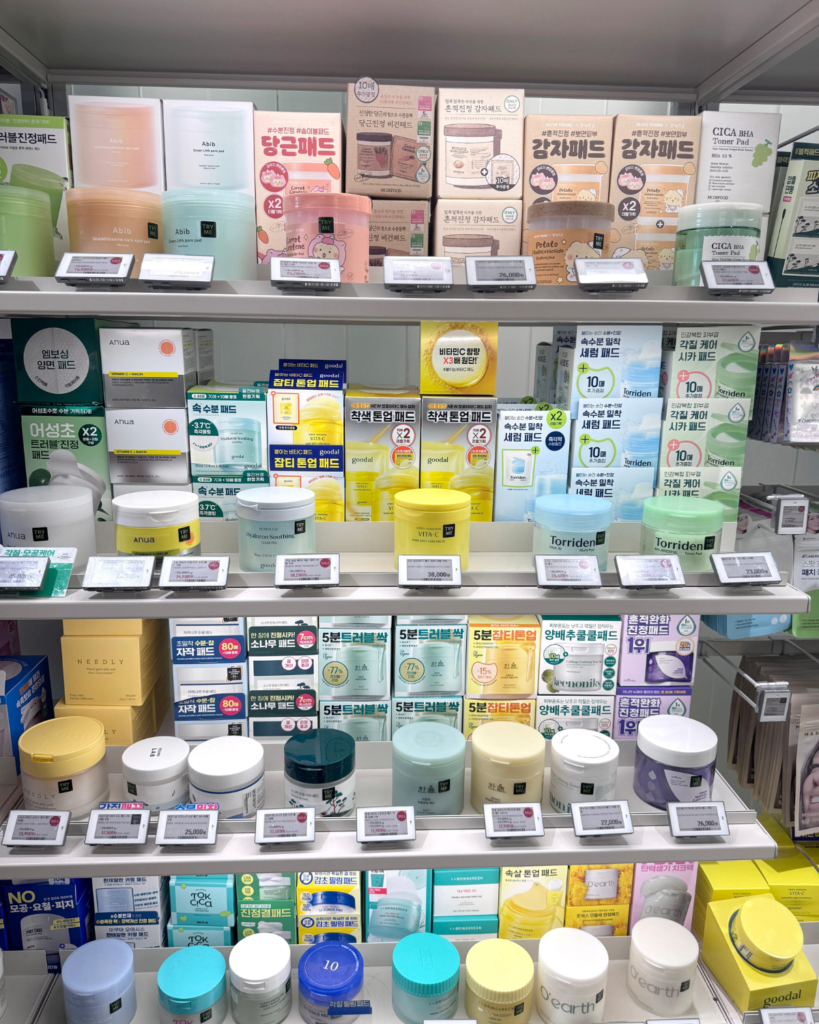 A skincare shelf at Olive Young