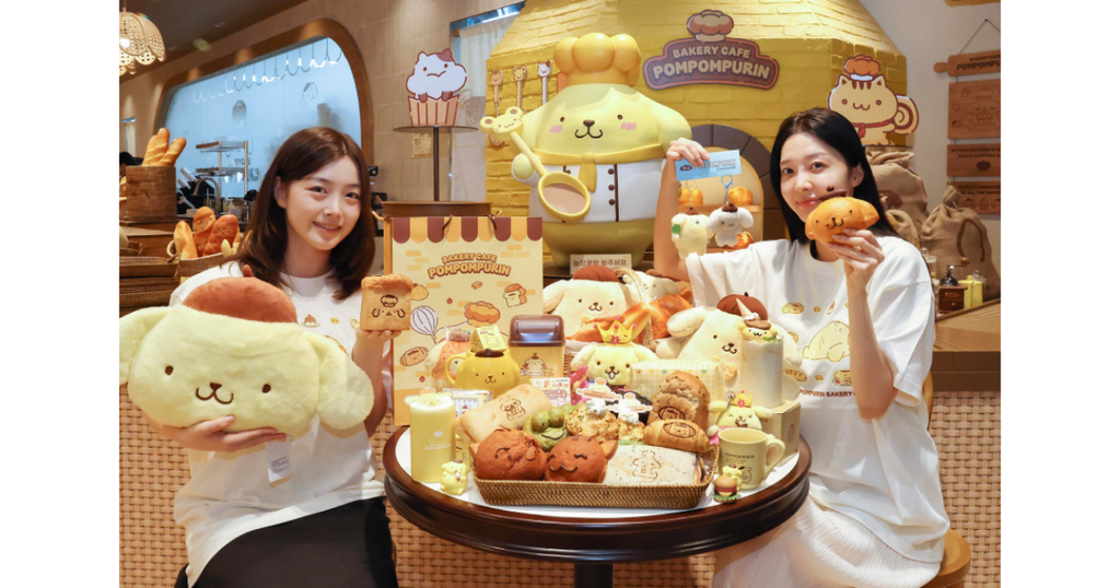 Custom Pompompurin-shaped custard pastries, beverages, and character merchandise displayed at the Pompompurin Bakery Cafe in Seoul.