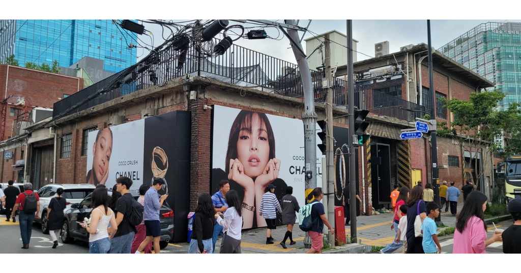 Shoppers outside walking around the shopping district of Seongsu, Korea